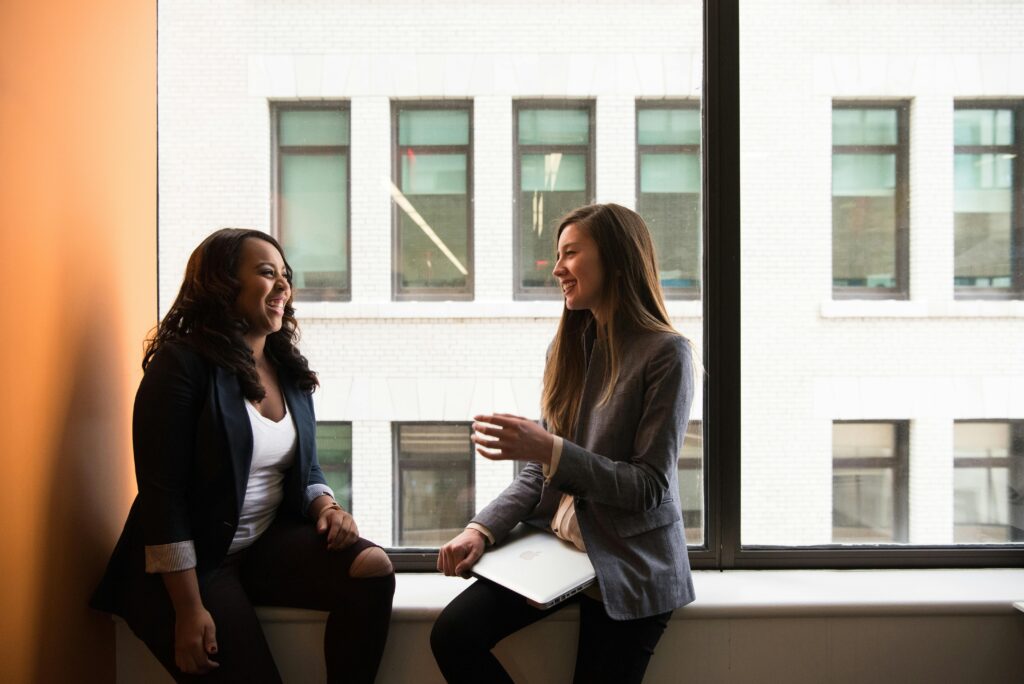 Two employees socializing