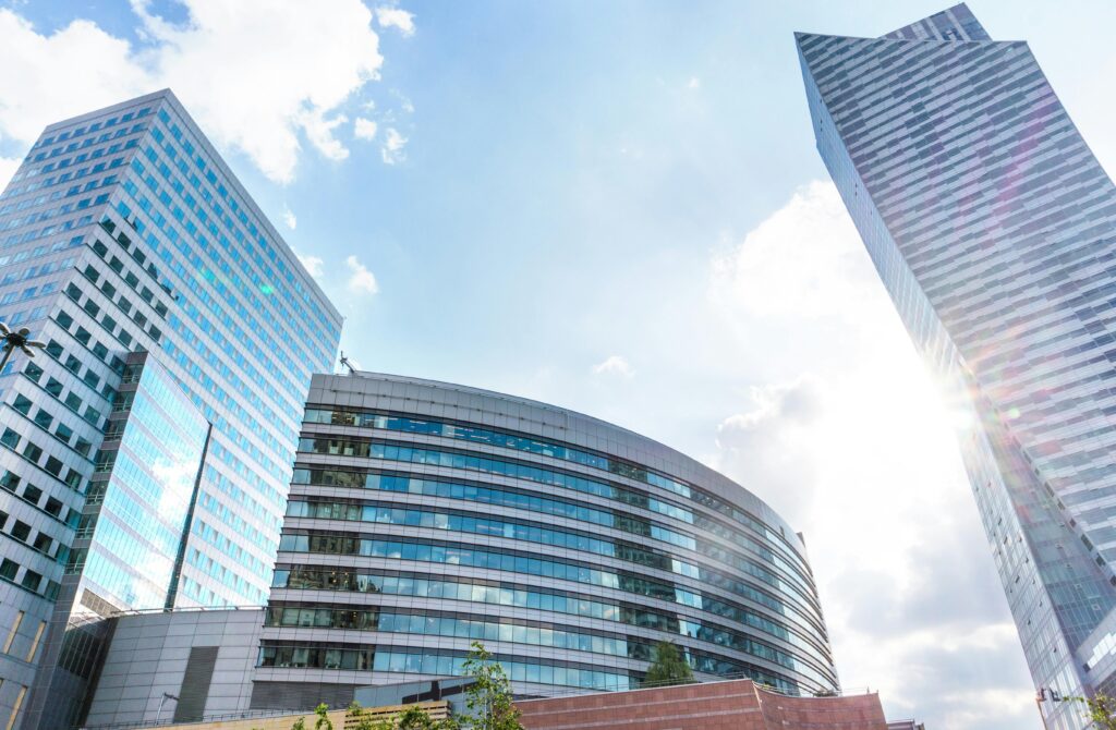 A shot of three buildings in bright sunlight