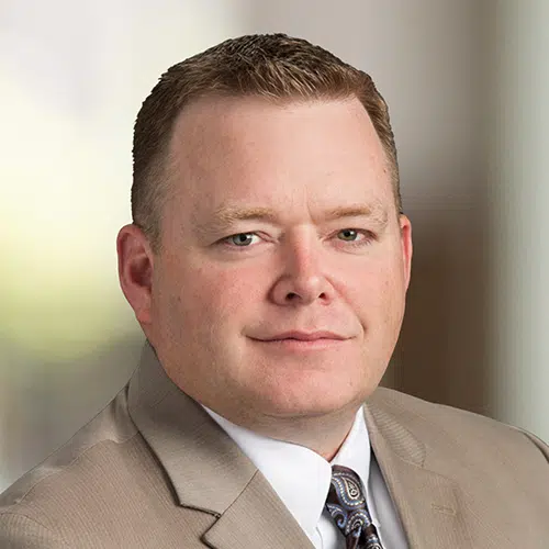Headshot of Clint Crane, Tax Partner