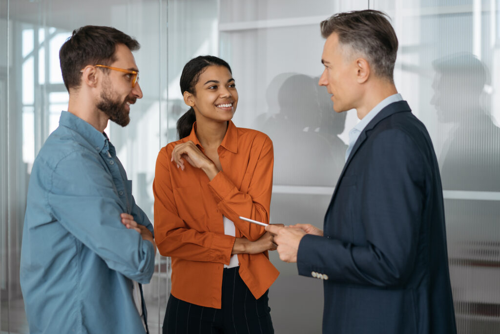 Group of business people working in modern office, planning start up, talking, discussion creative ideas. Successful business concept
