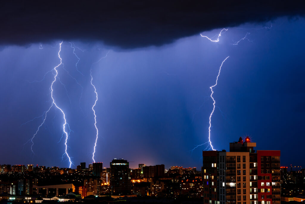 Thunderstorm with lightning over the night city