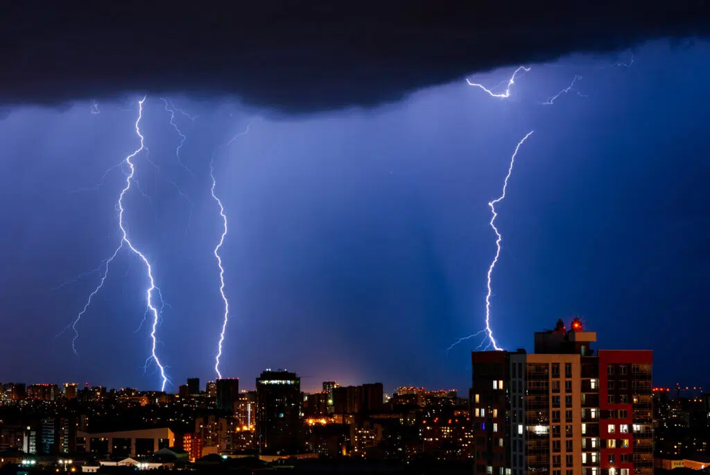 Thunderstorm with lightning over the night city