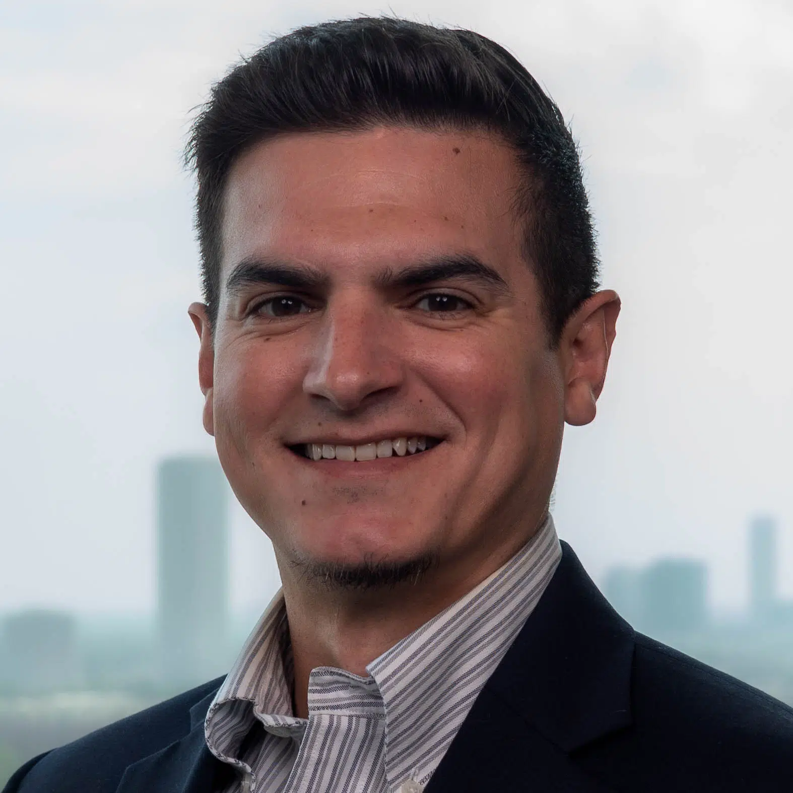 Headshot of Justin Gross. CAAS Senior Manager